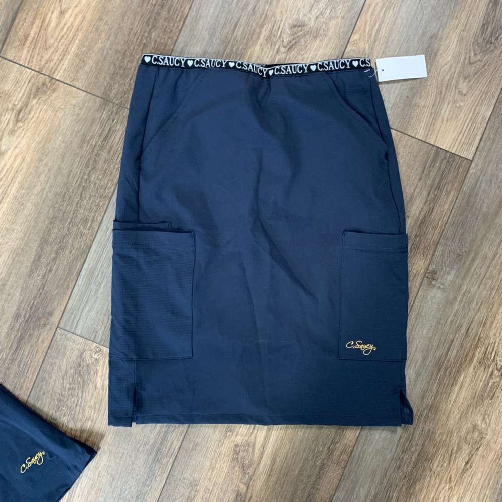 Scrub skirt and shirt! 😍 C. Saucy scrub shirt and skirt set. Navy blue. New!